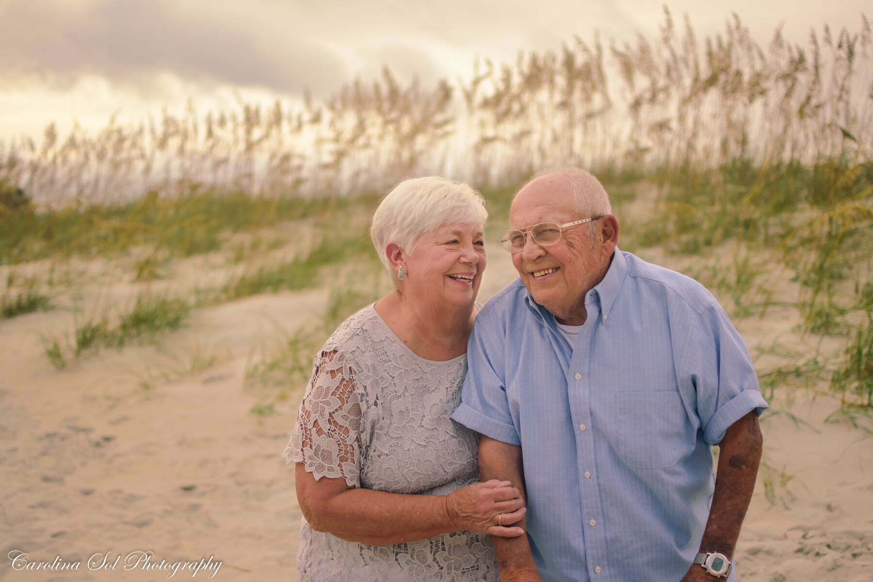 Elderly couple beach portrait family photography Holden Beach NC.