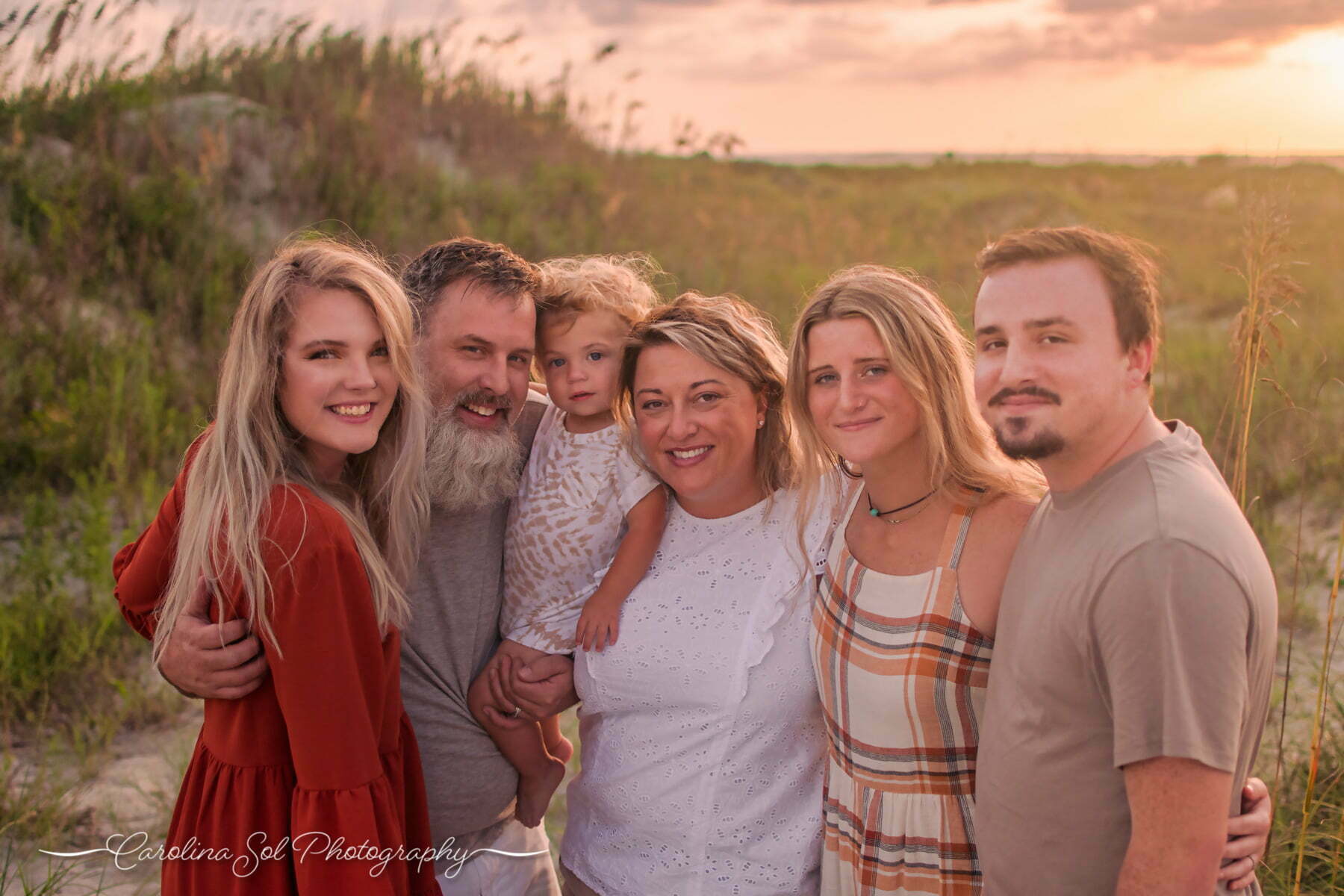 Lifestyle family photography sunset beach session with the spencer family.