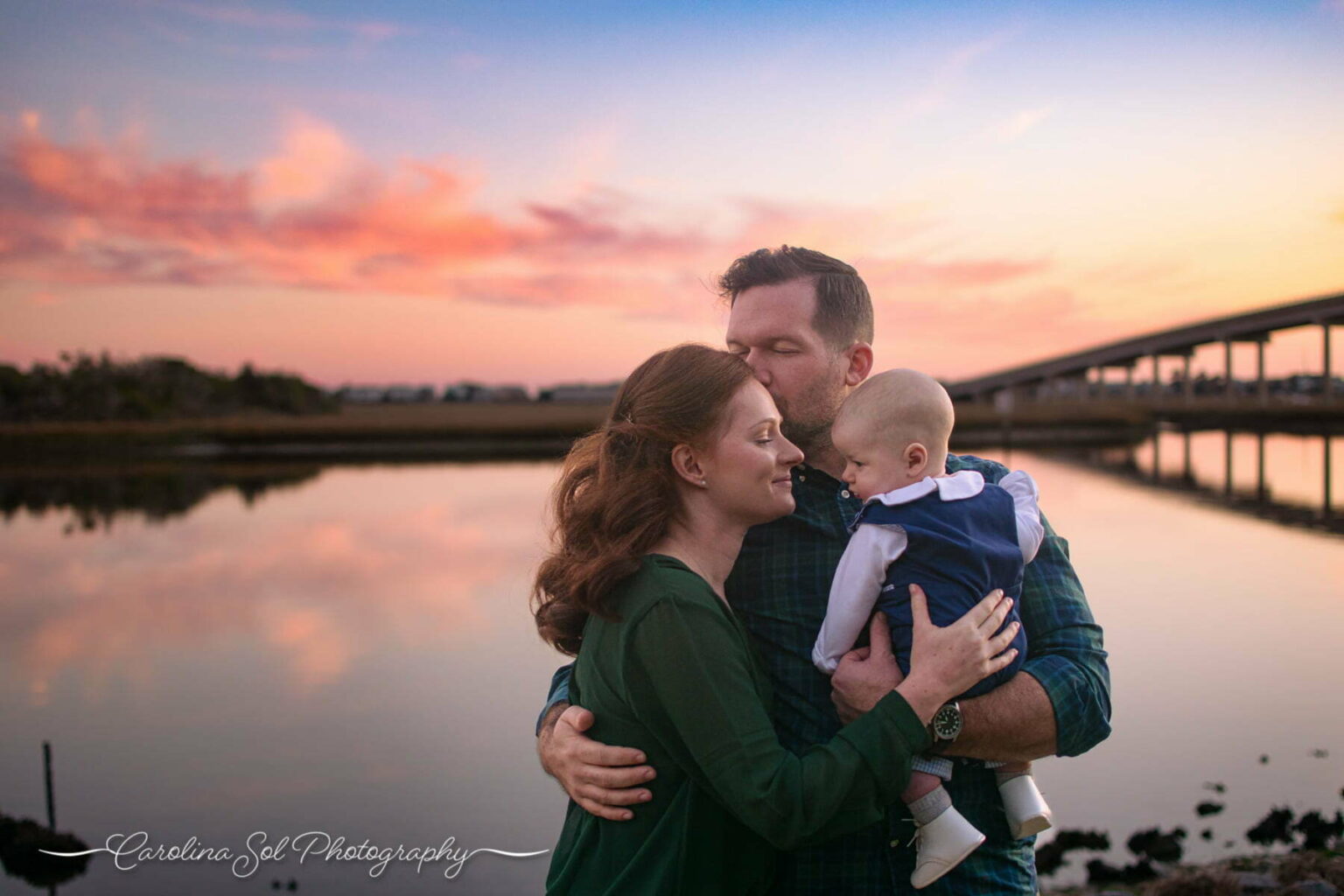 festive-baby-s-first-christmas-at-sunset-beach-family-photography