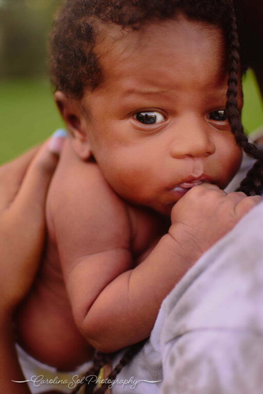 Lifestyle newborn portrait photography session Shallotte, NC.