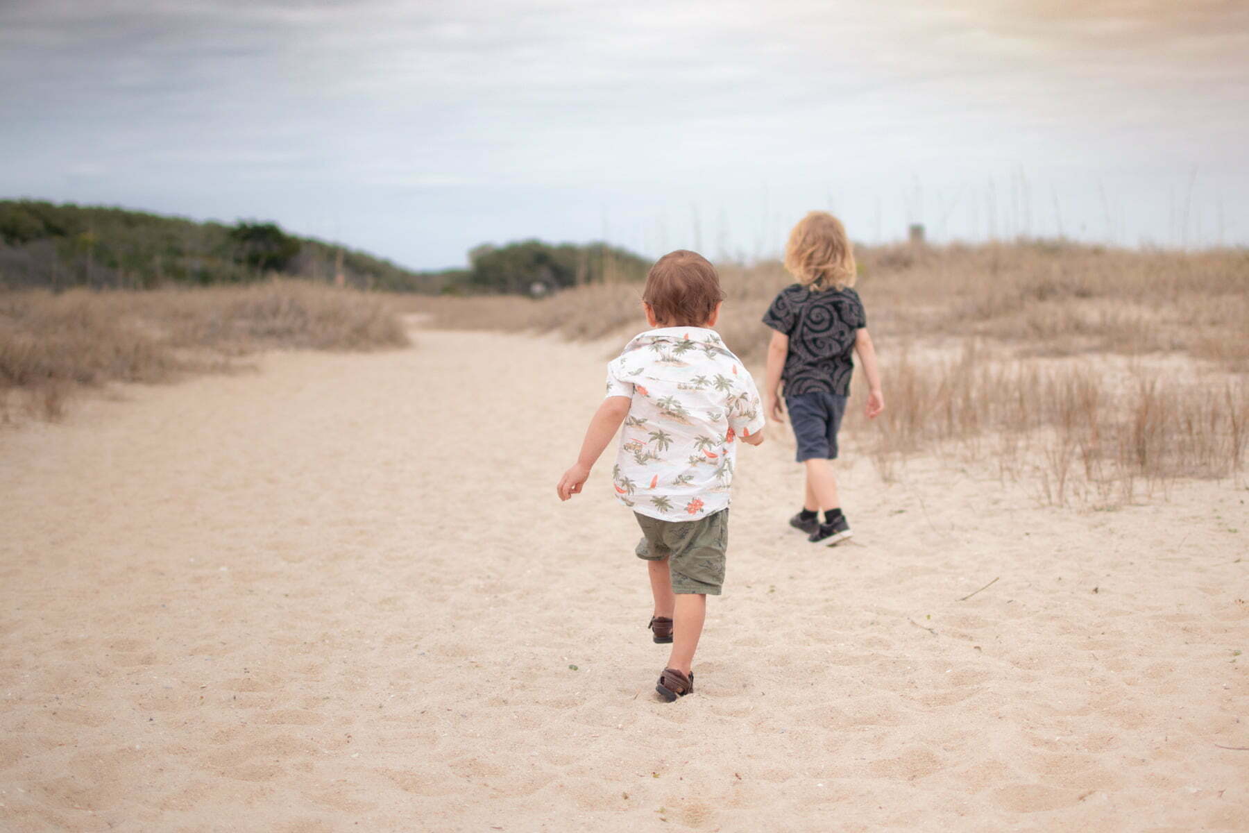 Lifestyle family photography Kure Beach Fort Fisher trail.
