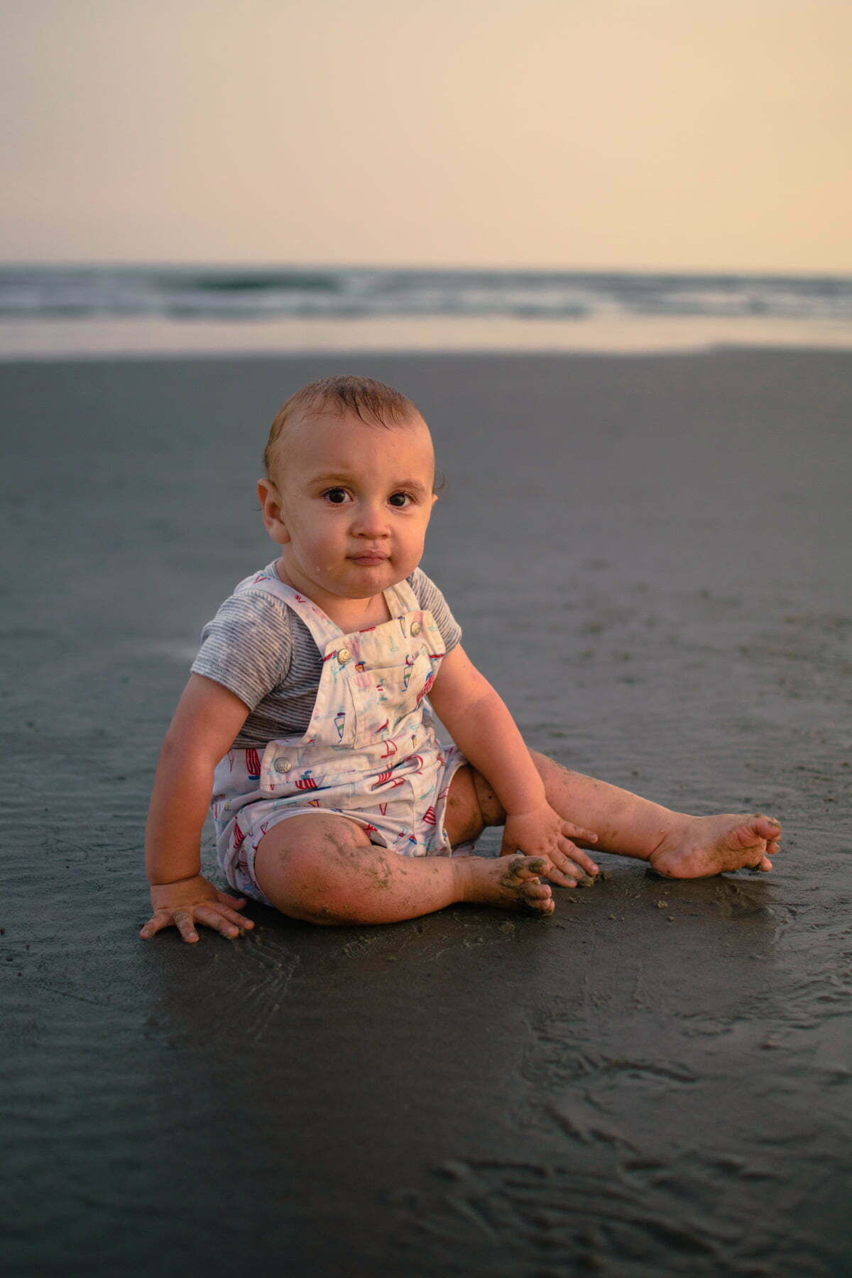 Baby milestone beach portrait photography Sunset Beach NC.