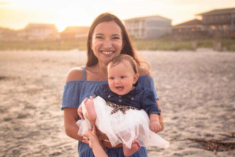 Lifestyle newborn family photography session on Holden Beach, NC.