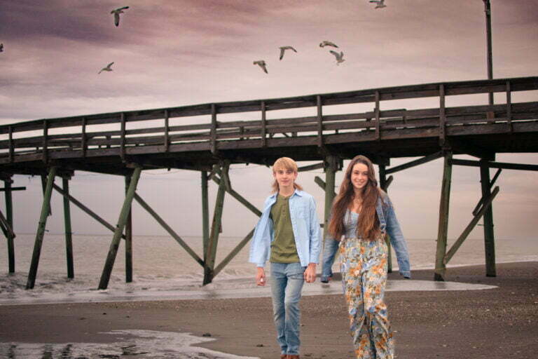Family portrait photography session Holden Beach pier, NC.
