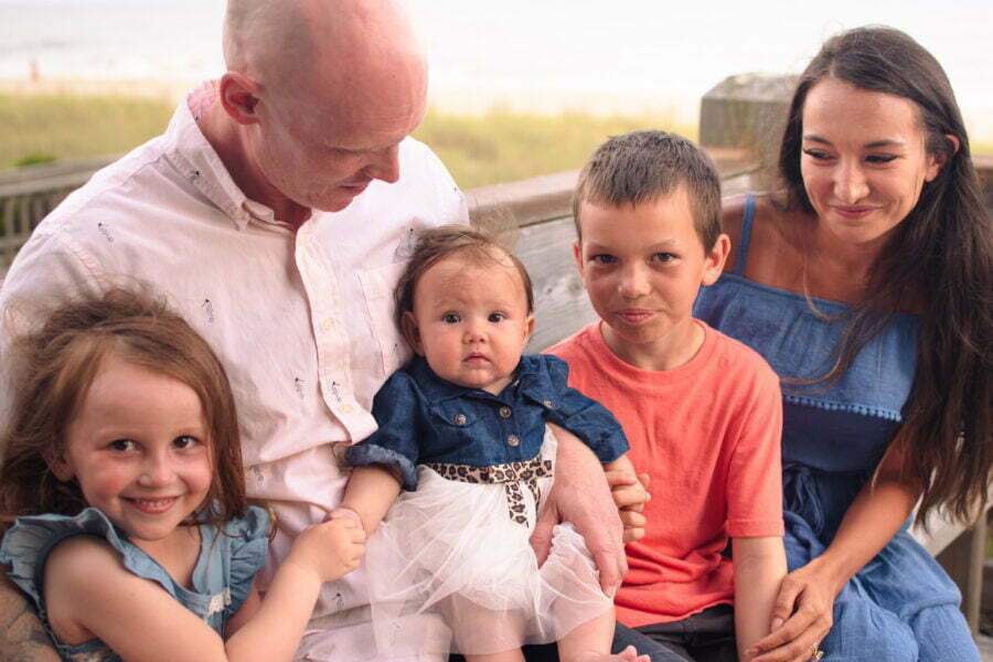Lifestyle family photography session with newborn at Holden Beach, NC.