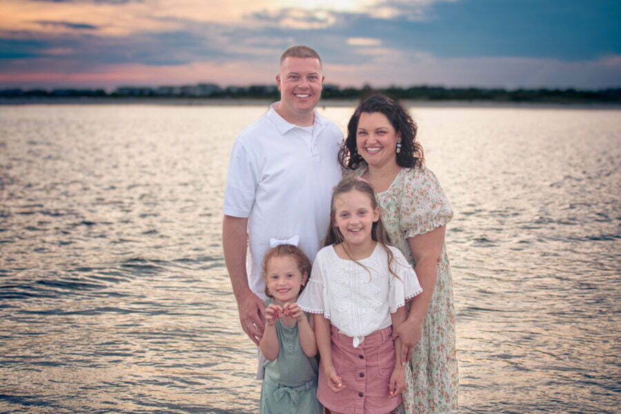 Lifestyle family photography session at sunset on Oak Island, NC.