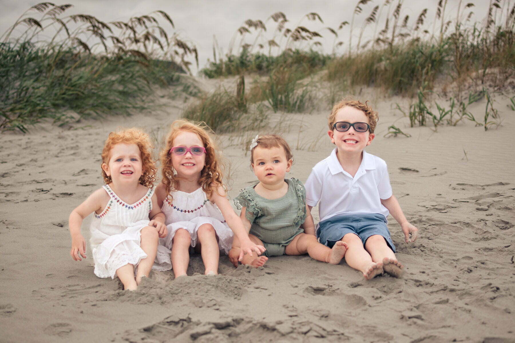 Oak Island, NC lifestyle family photography child beach portrait.