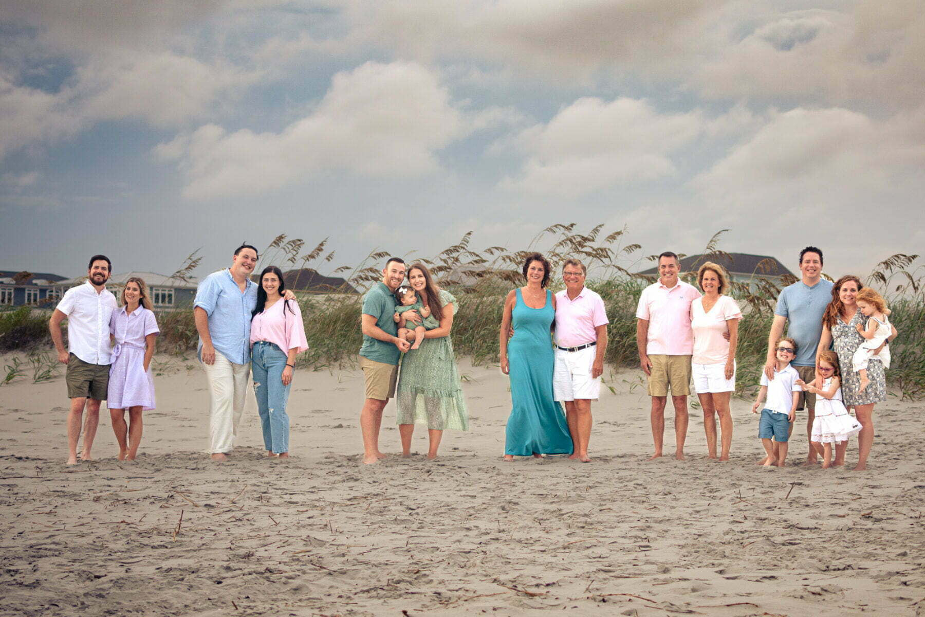 Extended family generational portrait photography session on the beach at Oak Island, North Carolina.
