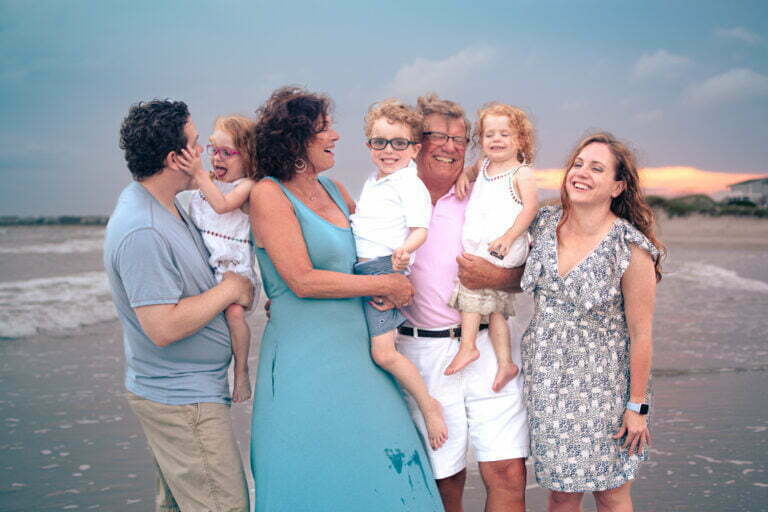 Oak Island, NC lifestyle candid family photography on the beach.
