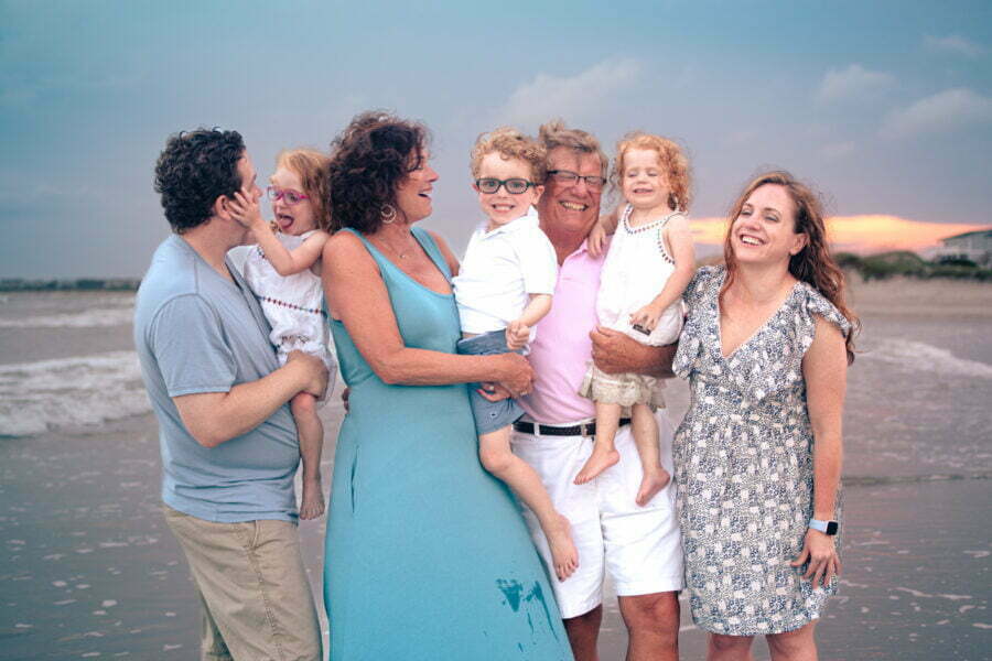 Oak Island, NC lifestyle candid family photography on the beach.