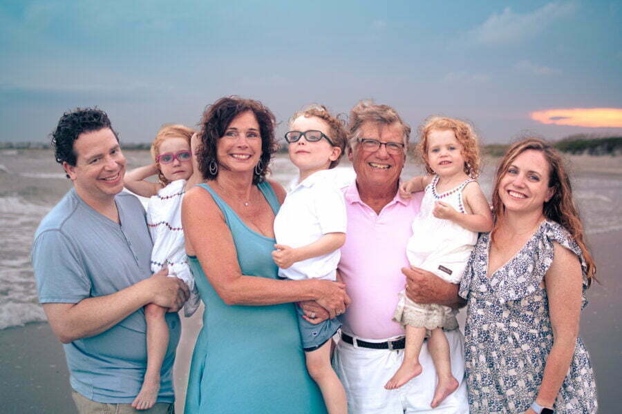 Oak Island, NC family photography session on the beach with extended family.
