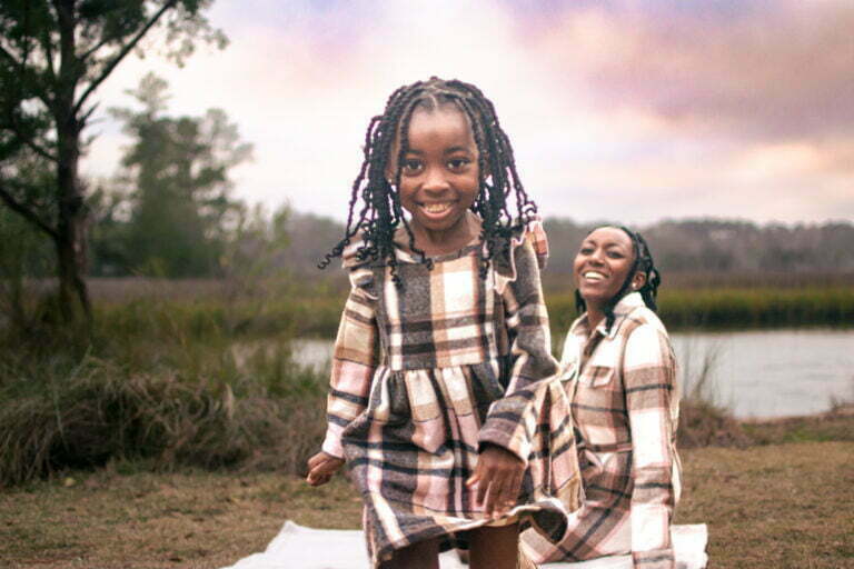 Lifestyle family photography session at Shallotte Riverwalk in North Carolina.