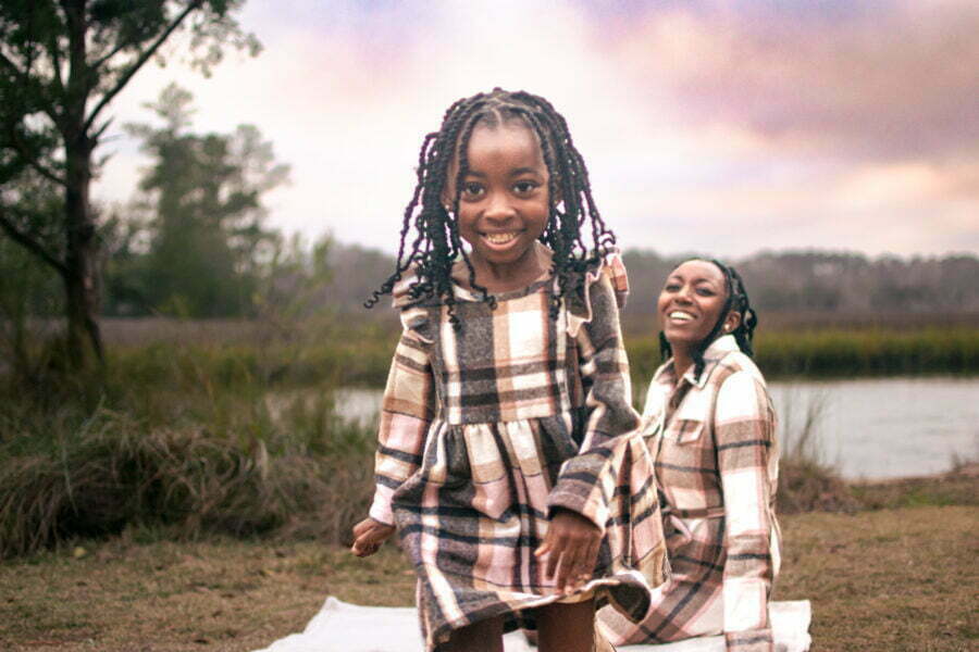 Lifestyle family photography session at Shallotte Riverwalk in North Carolina.