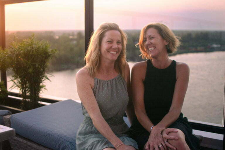 Professional group headshot portrait photography rooftop Wilmington, NC.