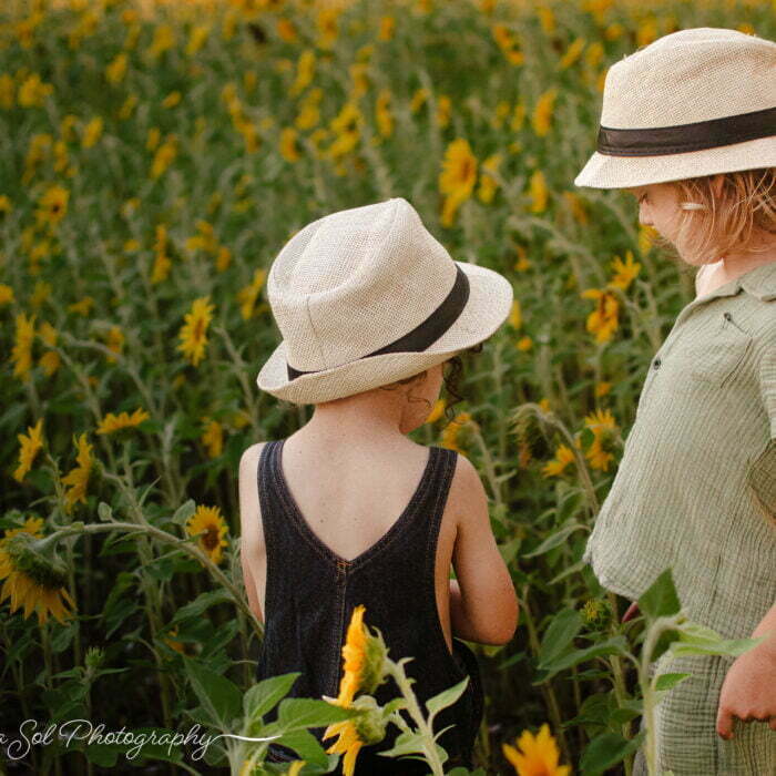 Sunflower field lifestyle family photography Holden Beach, NC.