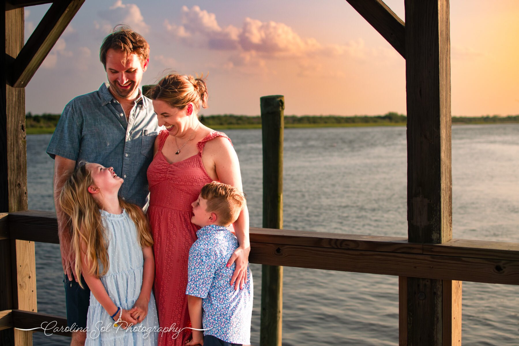 Lifestyle family photography along intracoastal waterway in Sunset Beach, NC.