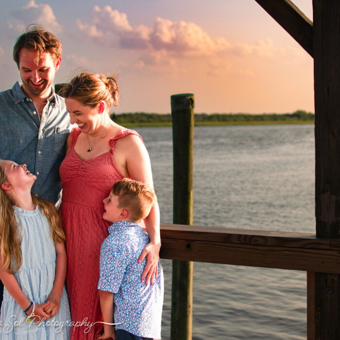 Lifestyle family photography along intracoastal waterway in Sunset Beach, NC.